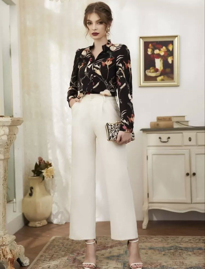Black Floral Long Sleeve Blouse (Category: Blouses) located in Makati City. Submitted by cee_store (Listing ID 1441889154, Image 3). Description: - Elegant black blouse with a beautiful floral print. - Features long sleeves and a classic collared neckline. - Looks stylish tucked into high-waisted pants or skirts. - A versatile piece suitable for both work and evening occasions. - Made from comfortable fabric, ideal for layering..