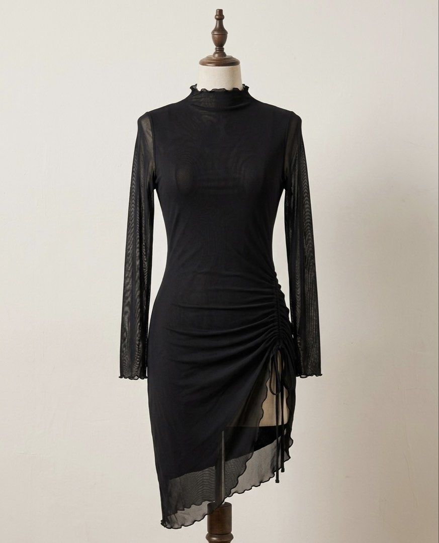 Black Mesh Ruched Long Sleeve Dress (Category: Dresses) located in Tanay. Submitted by Bunnylight (Listing ID 1441891597, Image 1). Description: - Black mesh long-sleeve dress - High neckline - Side ruching with drawstring - Asymmetrical hemline - Modern and chic design - Perfect for layering or wearing alone.