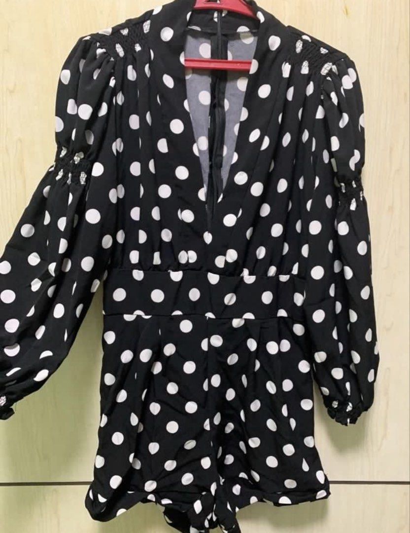 Black Polka Dot Romper / Play Suit with Puff Sleeves (Category: Rompers) located in Manila. Submitted by 00nmdeclutters (Listing ID 1441873322, Image 3). Description: • got this for P1,350 • worn once • plunging neckline • comes with a belt • can fit S-M.
