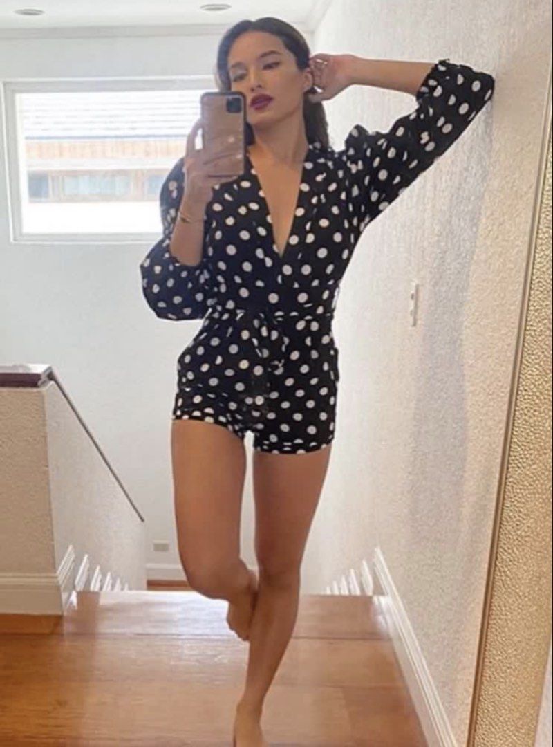 Black Polka Dot Romper / Play Suit with Puff Sleeves (Category: Rompers) located in Manila. Submitted by 00nmdeclutters (Listing ID 1441873322, Image 2). Description: • got this for P1,350 • worn once • plunging neckline • comes with a belt • can fit S-M.
