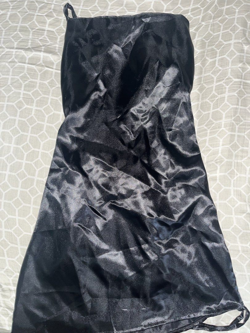 Black Satin Slip Dress with Tie Back (Category: Dresses) located in Manila. Submitted by arkhlves (Listing ID 1441916113, Image 1). Description: - Black satin slip dress - Spaghetti straps - Adjustable tie back detail - Fits like a size Small or Medium - Ideal for a night out or layering Size (Inches) L 27.5 W 18.