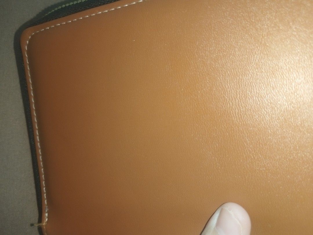 Brown Zip Around Wallet (Category: Wallets & Card holders) located in Manila. Submitted by everythingmustgo.18 (Listing ID 1441958769, Image 2). Description: - can fit cellphone - Brown zip-around wallet - Light blue zipper pull - Interior card slots - Main compartment for essentials - Clean inside and out - Ready for a new owner.