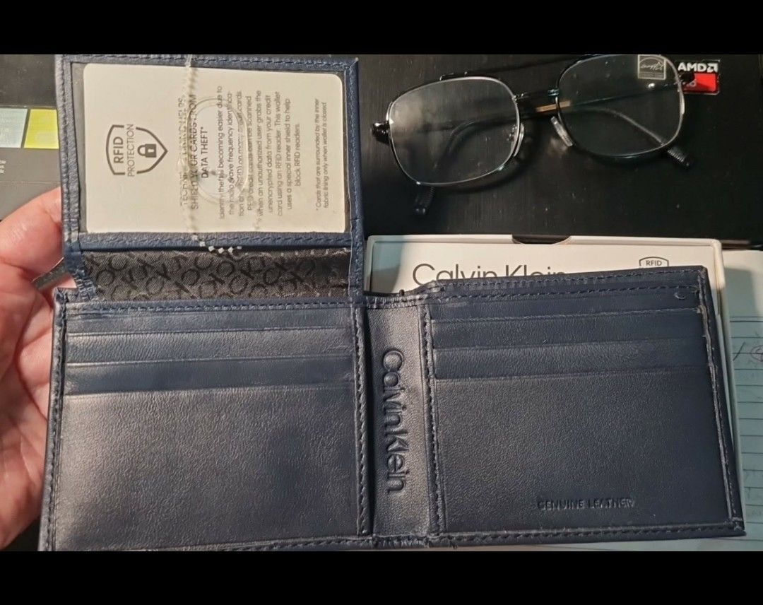 Calvin Klein Leather RFID Blocking Wallet - Multiple Colors (Category: Wallets & Card Holders) located in Angeles City. Submitted by ejhere (Listing ID 1441965895, Image 2). Description: - Genuine Leather Calvin Klein Wallets - RFID Blocking Technology for Security - Available Colors: Gray and Blue only - Comes in Original Calvin Klein Box - Ideal for Everyday Use or as a Thoughtful Gift.