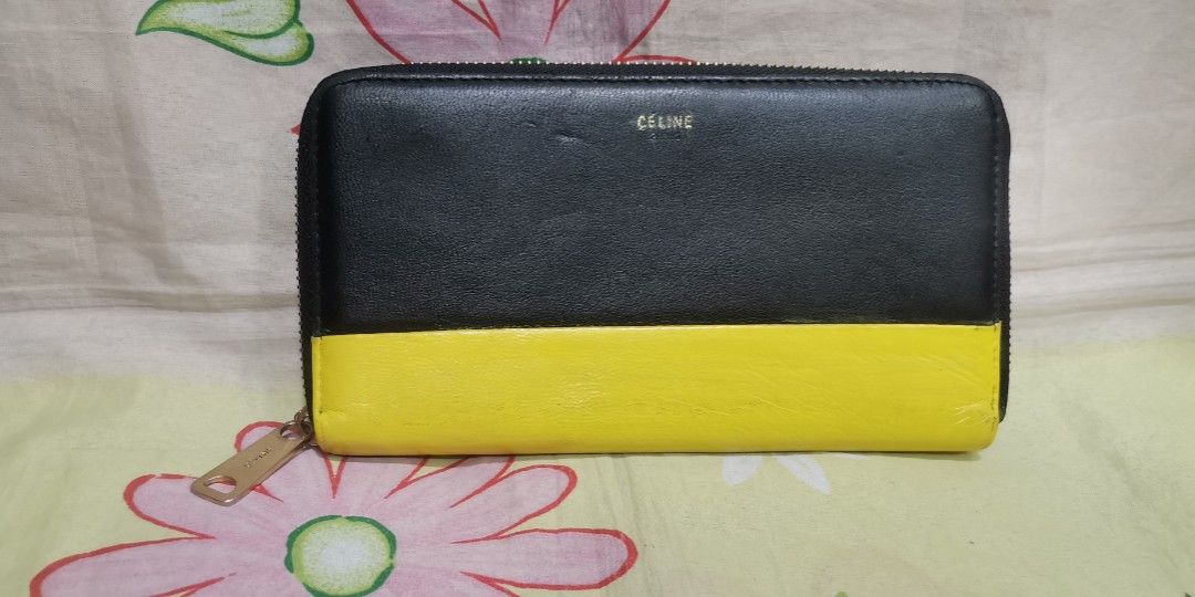 CELINE yellow black leather long full zip wallet (Category: Wallets & Card holders) located in Baguio. Submitted by princessjhade (Listing ID 1441872302, Image 1). Description: Very good condition Plus shipping.