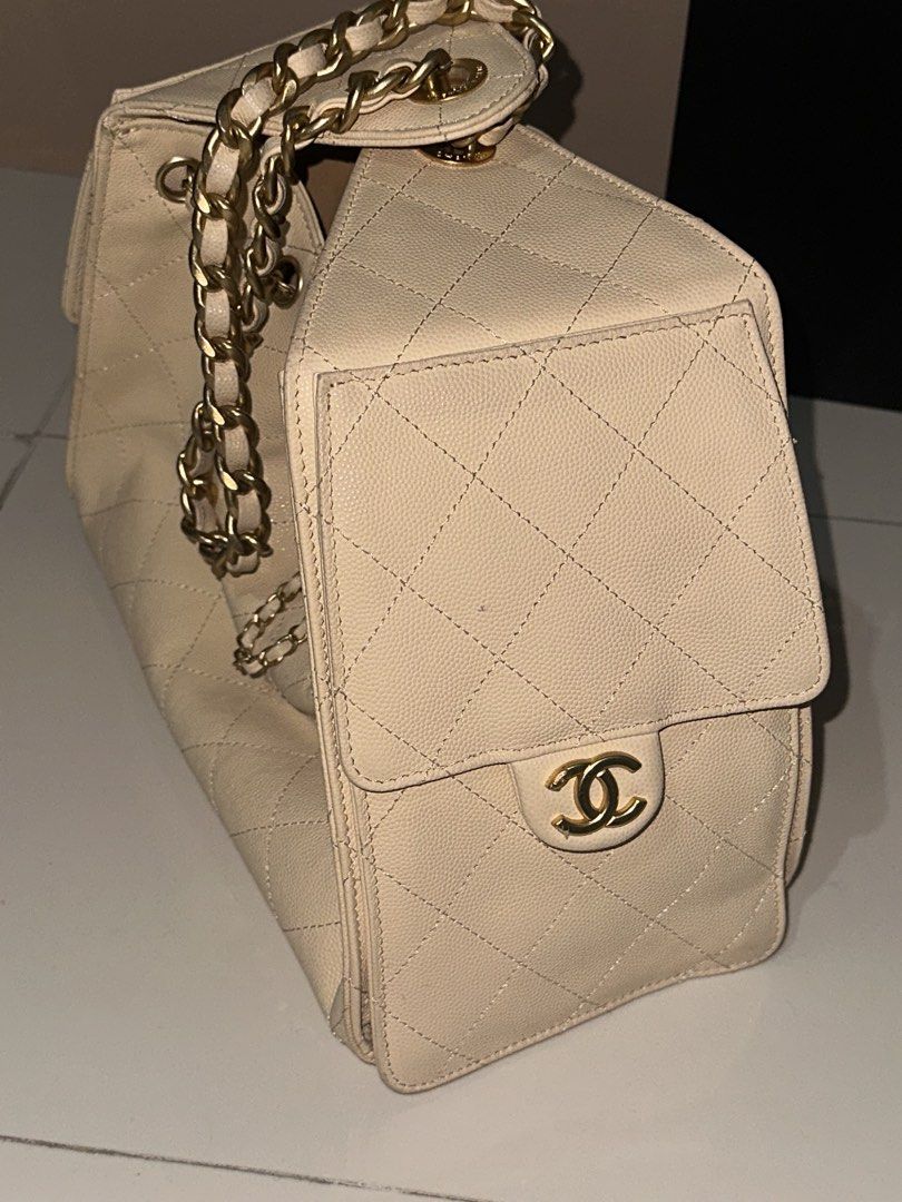 Chanel 25 Mini Beige Quilted Leather Drawstring Shoulder Bag (Category: Luxury Bags & Wallets) located in Manila. Submitted by beomcyj (Listing ID 1441853153, Image 3). Description: - Authentic Beige Chanel 25 Shoulder Bag - Classic Quilted Leather - Gold Chain Strap - Includes Original Dust Bag and Box - Interior Tag: Chanel Made in Italy - Front Flap Pocket with CC Logo Closure - Secure Drawstring Closure at Top.