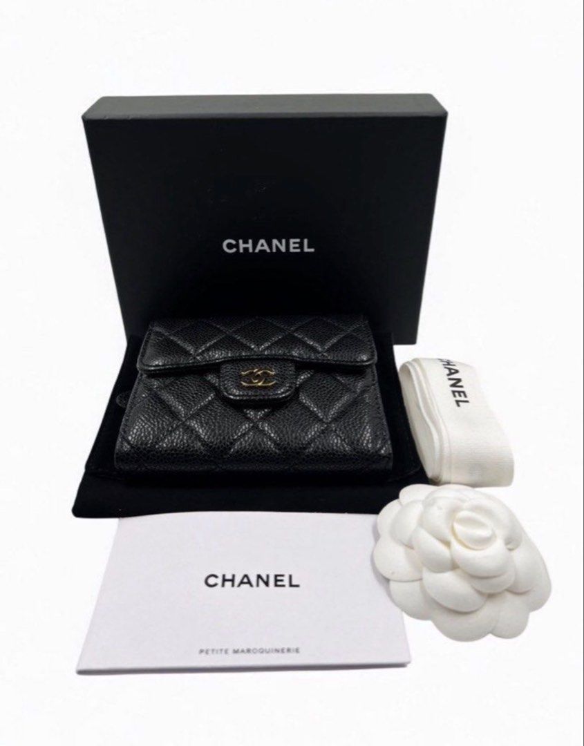 Chanel Leather Wallet (Category: Luxury Bags & Wallets) located in Paranaque City. Submitted by dailyrum (Listing ID 1441806544, Image 2). Description: Chanel Black (GHW) Quilted Caviar Leather Classic Wallet - Material: Black Quilted Caviar Leather - Hardware: Gold - Includes: Original Box, Dust Bag, Ribbon - Size: Small Condition: Pristine! 100% authentic, expertly-vetted preloved. Purchased from a well reviewed carousell shop. RFS - bigger tha