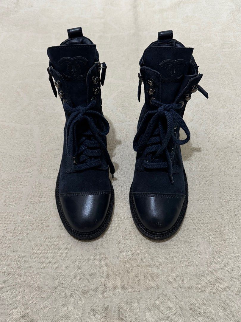 Chanel Quilted Combat Boots Navy Blue Suede (Category: Sneakers & Footwear) located in Angeles City. Submitted by luigisells (Listing ID 1441867343, Image 2). Description: size 39 Excellent Condition Issue/s: see 2nd pic Gcash / Bank Transfer from Angeles City, Pampanga.