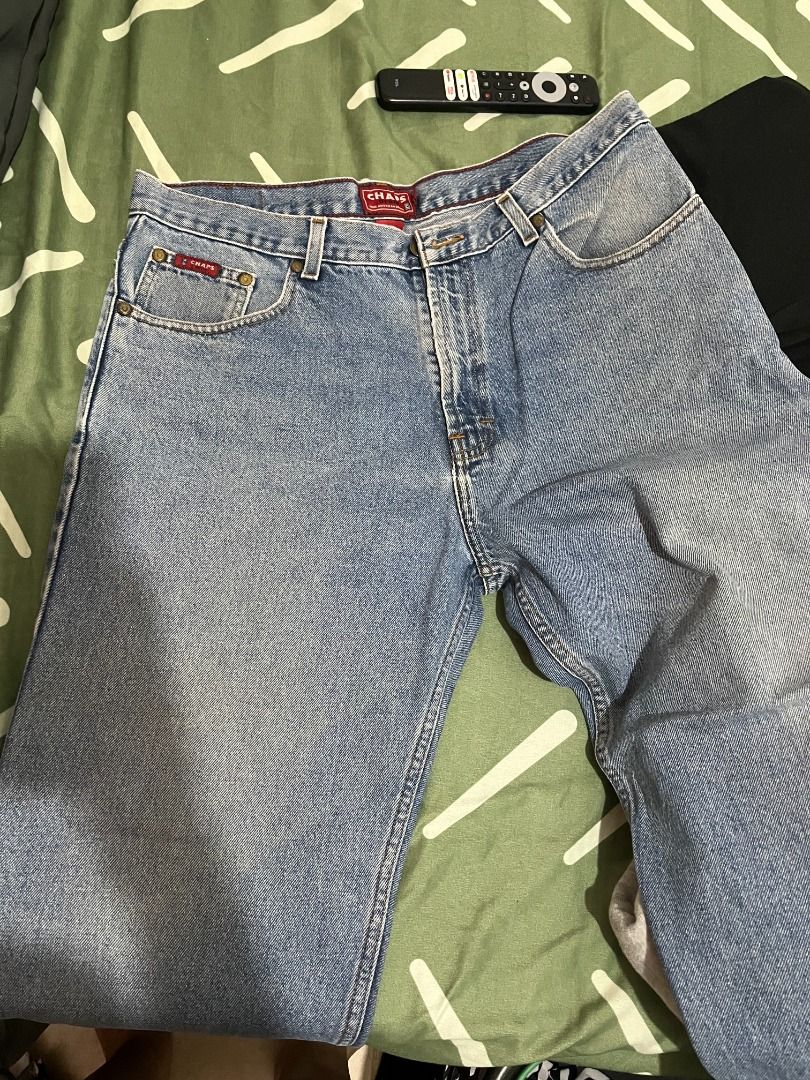 Chaps Denim Jeans - Light Wash (Category: Jeans) located in Cabanatuan. Submitted by declutteringhaven (Listing ID 1441800391, Image 1). Description: - Classic light wash denim jeans from Chaps - Straight leg fit for a timeless silhouette - Secure button and zip closure - Functional with two front and two back pockets - Versatile and perfect for everyday wear.