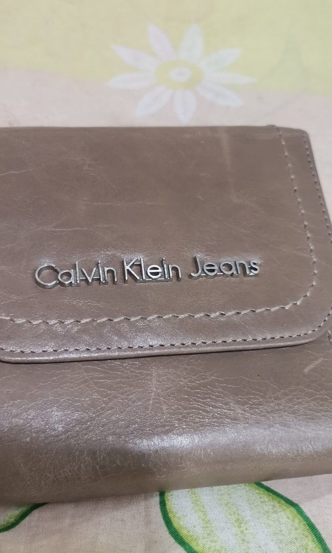 CK CALVIN KLEIN Light brown leather trifold wallet (Category: Wallets & Card holders) located in Baguio. Submitted by princessjhade (Listing ID 1441852593, Image 3). Description: Excellent condition Plus shipping.