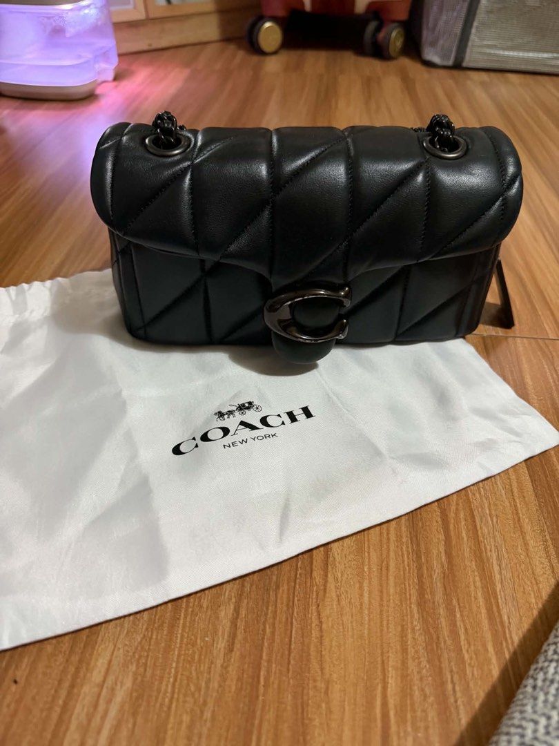 Coach Pillow Tabby Shoulder Bag 20 Black (Category: Luxury Bags & Wallets) located in Manila. Submitted by _tana (Listing ID 1441917801, Image 3). Description: PRELOVED COACH TABBY SHOULDER BAG 20 WITH PILLOW QUILTING A timeless and elegant piece that effortlessly elevates any outfit. • Preloved condition 8/10 • Includes Coach hangtag and dust bag only • Minimal scratches on the logo hardware • Beautitul pillow quilting design • Classic black col