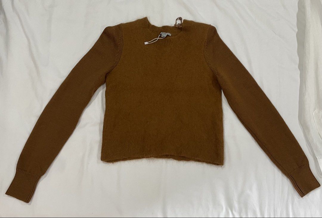 COS Brown Wool Sweater FREE SHIPPING (Category: Coats, Jackets and Outerwear) located in Tagbilaran City. Submitted by dianne.closet (Listing ID 1441833712, Image 1). Description: - Brand: COS - Color: Brown - Material: Angora and wool blend - Texture: Fuzzy - Condition: New, tag detached, never worn - Size small, stretchy - Style: cropped length - Purchased from a Carouseller. I’m reselling it because the fabric inside (except for the sleeves) f