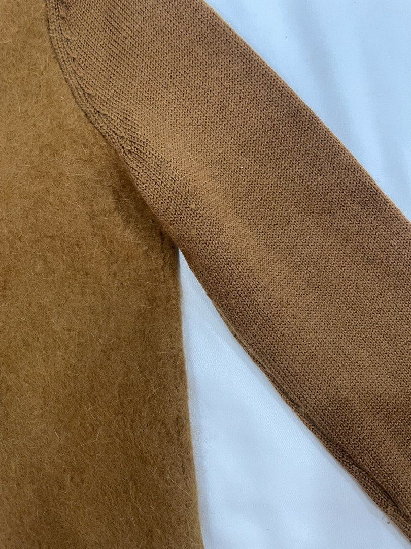 COS Brown Wool Sweater FREE SHIPPING (Category: Coats, Jackets and Outerwear) located in Tagbilaran City. Submitted by dianne.closet (Listing ID 1441833712, Image 3). Description: - Brand: COS - Color: Brown - Material: Angora and wool blend - Texture: Fuzzy - Condition: New, tag detached, never worn - Size small, stretchy - Style: cropped length - Purchased from a Carouseller. I’m reselling it because the fabric inside (except for the sleeves) f