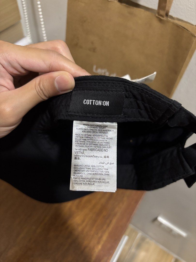 Cotton:On Saint Tropez Baseball Cap (Black) (Category: Caps & Hats) located in Rizal. Submitted by bitethehand (Listing ID 1441968803, Image 3). Description: Features a 'Saint Tropez' embroidery on front with an adjustable strap at the back. Material: Cotton Origin: Made in Vietnam Condition: Brand new with original tags attached..