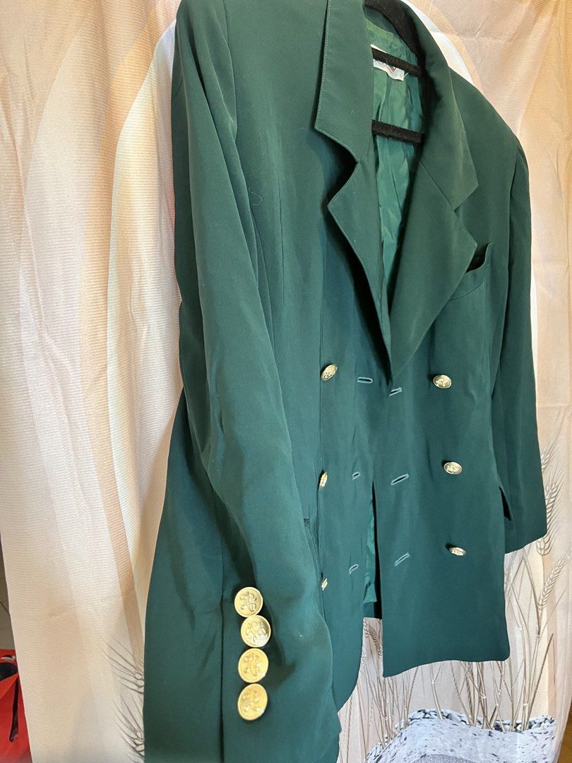 Dark Green Double-Breasted Blazer with Gold Buttons (Category: Coats, Jackets and Outerwear) located in Quezon City. Submitted by florvallera (Listing ID 1441821807, Image 2). Description: - Classic dark green blazer - Double-breasted front with gold-toned buttons - Two front pockets - Fully lined interior - Perfect for dressing up or down - Ideal for work or a night out -buttons complete.