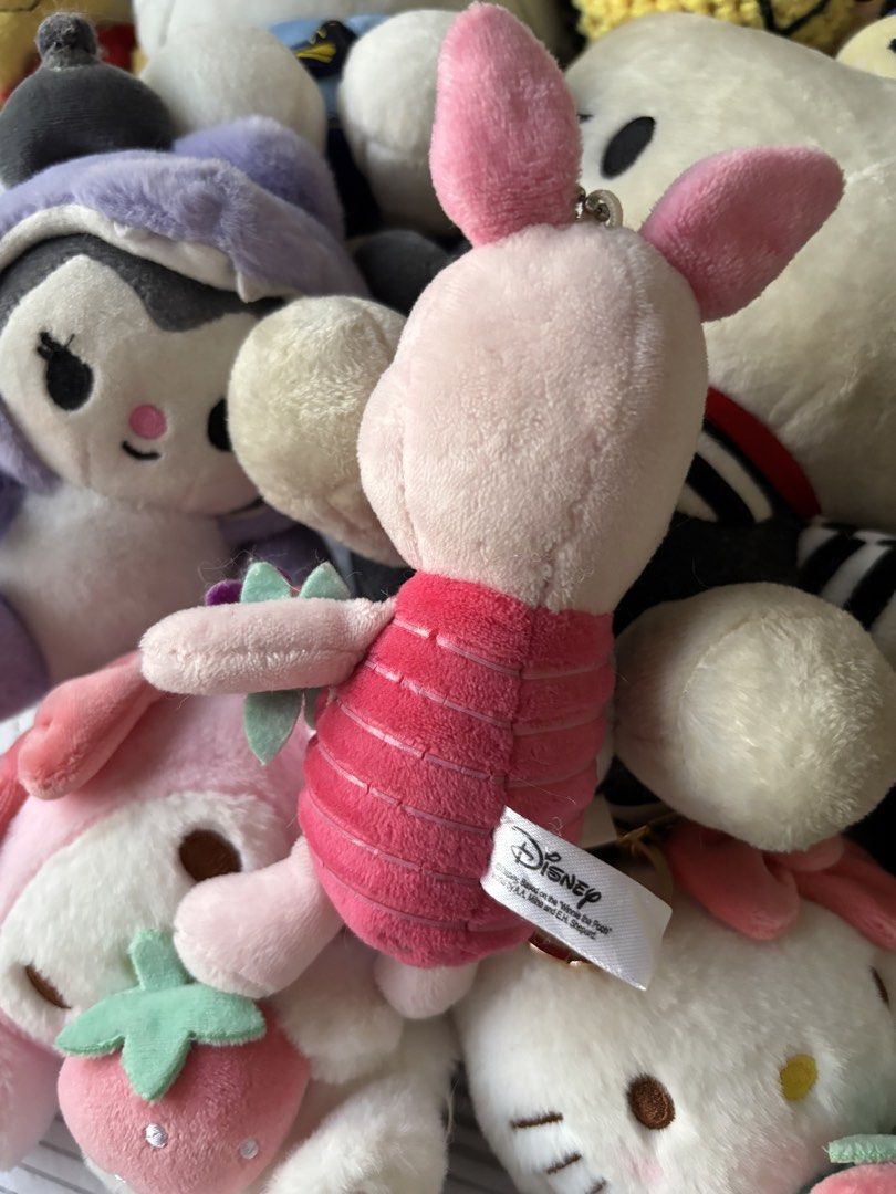 Disney Piglet Plush Keychain with Flower Charm (Category: Plushies & Soft Toys) located in Manila. Submitted by mpt99876 (Listing ID 1441798537, Image 2). Description: - Adorable Disney Piglet plush keychain - Features a pink, striped body - Comes with a cute flower charm - Small and portable, ideal for attaching to bags or keys - A must-have for any Disney fan!.