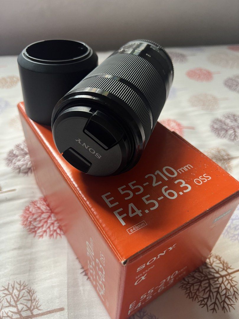 E mount 55-210mm Lens (Category: Lens & Kits) located in Calauan. Submitted by vanni_23 (Listing ID 1441925934, Image 1). Description: - Sony E-mount telephoto zoom lens - Versatile focal range: 55mm to 210mm - Optical SteadyShot for blur-free images - Includes lens hood and original box - Ideal for capturing distant subjects -Very minimal signs of use -No signs of fungus. Clean lens -Well taken care of. Kept in an airtight sealed case. Bought ne