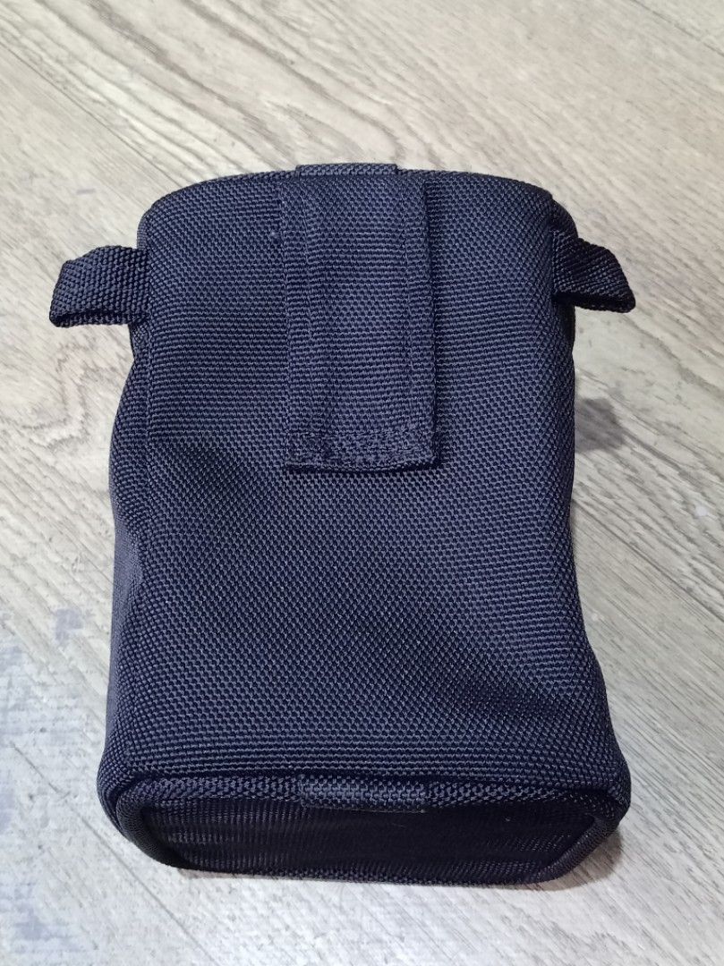 EX SIGMA Camera Lens Pouch Carrier (Category: Camera Bags & Carriers) located in San Fernando. Submitted by gelo.archive (Listing ID 1441807867, Image 2). Description: Black Sigma EX Camera Lens Case P 499 Zipper closure Includes a protective foam insert Features a belt loop for easy carrying - Designed for lens storage and transport.