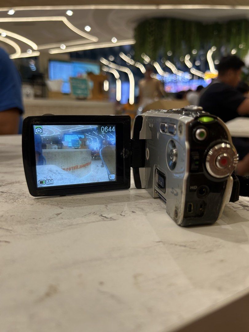 Exemode camcorder handycam digital camera digicam (Category: Cameras) located in Lagonoy. Submitted by nadayojiii (Listing ID 1441864497, Image 2). Description: ALL WORKING RETRO VIBE SHOTS BATTERY DOOR NEEDS TAPE OR STICKERS HAS DIRT IN LCD(output not affected).