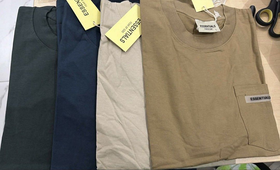 Fear of God Essentials T-Shirt (Category: Tshirts & Polo Shirts ) located in Manila. Submitted by iamfashionistapage (Listing ID 1441801493, Image 1). Description: - Brand: Fear of God Essentials - Material: Great quality cotton Top G - Style: Perfect for casual wear - Availability: Multiple colors and sizes - Packaging: Individually packaged - Get yours now! PM FOR AVAILABLE SIZE: l- XXL.