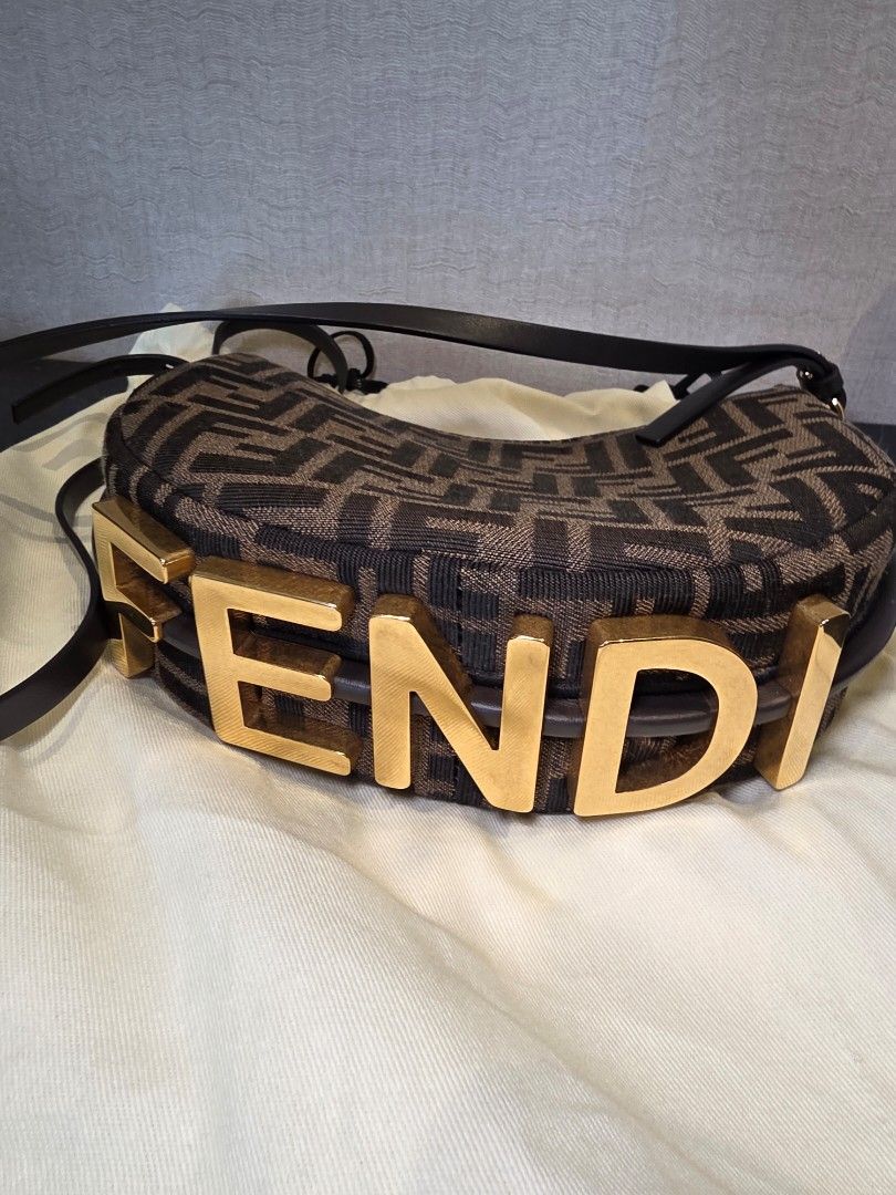 Fendi Fendigraphy Mini Authentic (Category: Luxury Bags & Wallets) located in Pasig City. Submitted by vthing (Listing ID 1441818816, Image 2). Description: Condition: Excellent pre-loved condition with well-maintained canvas, clean interior, and bright hardware. Features: • Classic FF jacquard canvas • Gold-tone hardware • Zip-top closure • Leather trim and detailing • Compact yet practical interior • Lightweight and comfortable to carry Include