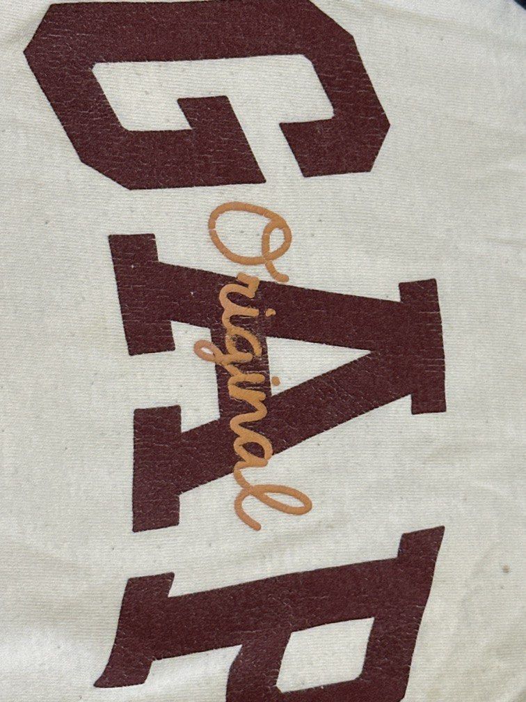 GAP kids shirt (Category: Babies & Kids Fashion) located in Bustos. Submitted by krjavier (Listing ID 1441790882, Image 2). Description: Free pag bumili ng 2 kids shirts sa listing 2-3 years old Issue: cracked print and discoloration.