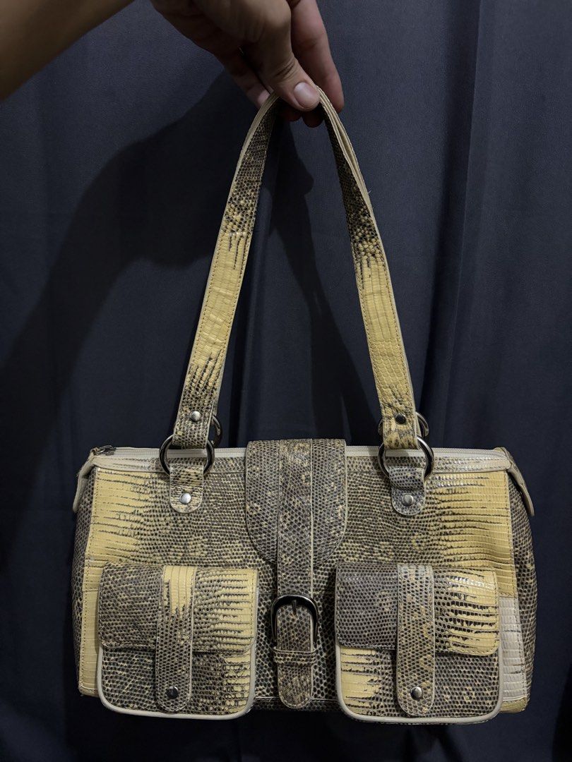 Genuine Ombre Lizard Shoulder Bag - Legacy (Category: Luxury Bags & Wallets) located in Munoz. Submitted by lolongs (Listing ID 1441862339, Image 1). Description: - Genuine Monitor Lizard leather - Exotic skin/Animal skin - Vintage Coach Legacy Inspired - Suede lining - This is in good VINTAGE condition. Vintage po ito and bawal sa super selan and arte. - Super unique and striking piece - Slightly negotiable.
