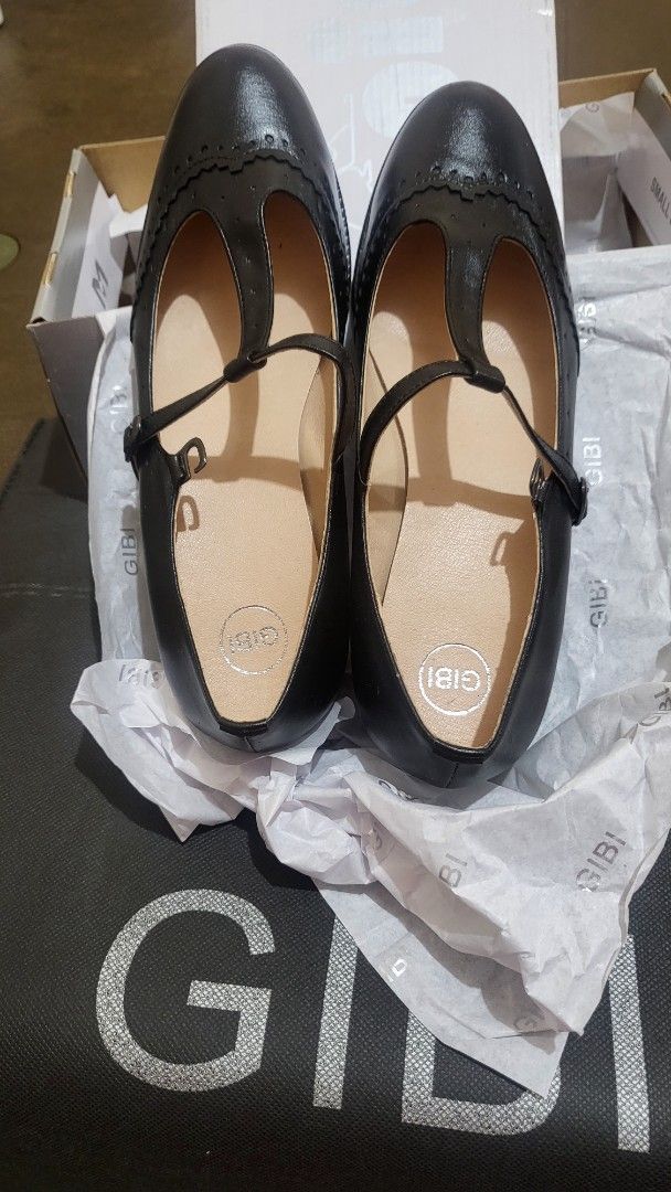 Gibi Black T-Strap Brogue Mary Jane Flats (Category: Flats & Sandals) located in Binmaley. Submitted by belindara28009 (Listing ID 1441904306, Image 1). Description: - Classic black leather Mary Jane flats - Features a T-strap and elegant brogue detailing - Comfortable round toe design - Durable rubber sole with a slight heel - Includes original box - Ideal for school uniforms or smart casual outfits.
