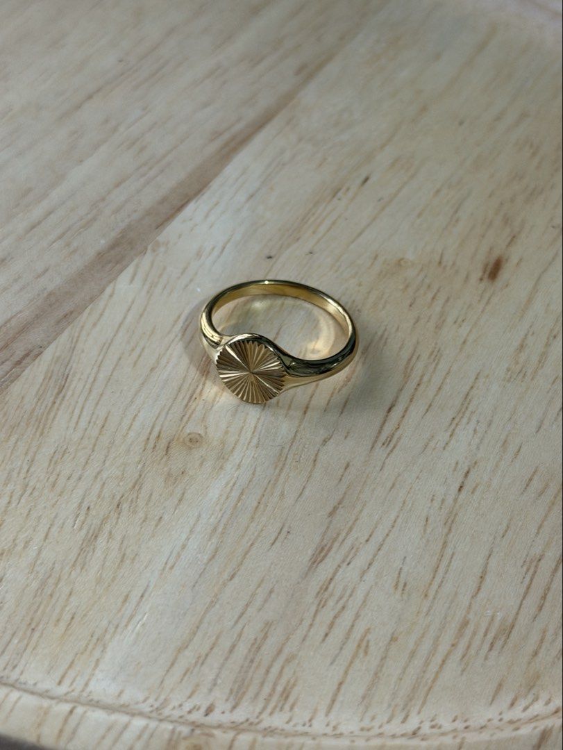 Gold Disc Ring (Medium) (Category: Rings) located in Pasig City. Submitted by paolasoriano_wind (Listing ID 1441886293, Image 1). Description: Size 6 to 7 (Medium). Non-tarnish. Lightly used, excellent condition. Fancy jewelry only. Not Gold. No dust bag included. Purchased for P1,399 from Sunspell (local brand similar to Penny Pairs). .
