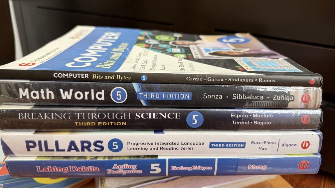 Grade 5 Textbooks: Math, Science, English, Araling Panlipunan, Computer (Category: Textbooks) located in Quezon City. Submitted by aini29 (Listing ID 1441853018, Image 1). Description: - Grade 5 Textbook Bundle - Includes: Math World, Breaking Through Science, Pillars, Lahing Dakila, Computer Bits and Bytes - All books are 3rd Edition - Publisher: C&E Publishing, Inc. - Ideal for Grade 5 students - Bundle includes all 5 books.