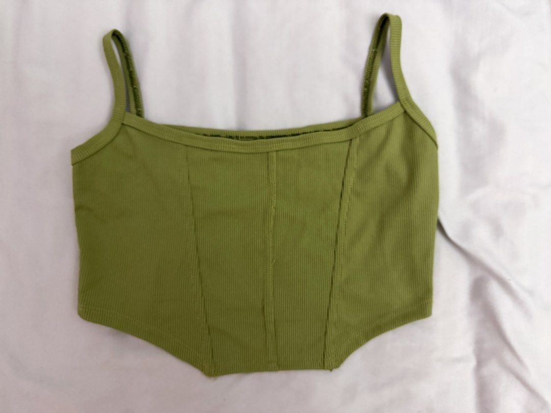 Green Corset-Like Sleeveless Crop Top (Category: Sleeveless) located in Manila. Submitted by bikosan (Listing ID 1441846151, Image 1). Description: used only once. one size (small-medium) rfs: decluttering location: taft ave, manila buyer shoulders sf.