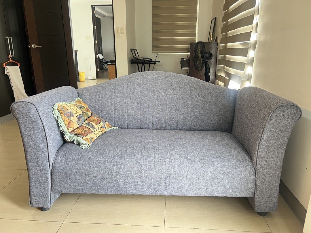 Grey Two-Seater Sofa with Curved Back (Category: Sofas) located in Quezon City. Submitted by jensineg (Listing ID 1441838892, Image 1). Description: - Grey Fabric Sofa - Two seater - 155cm x 50cm.