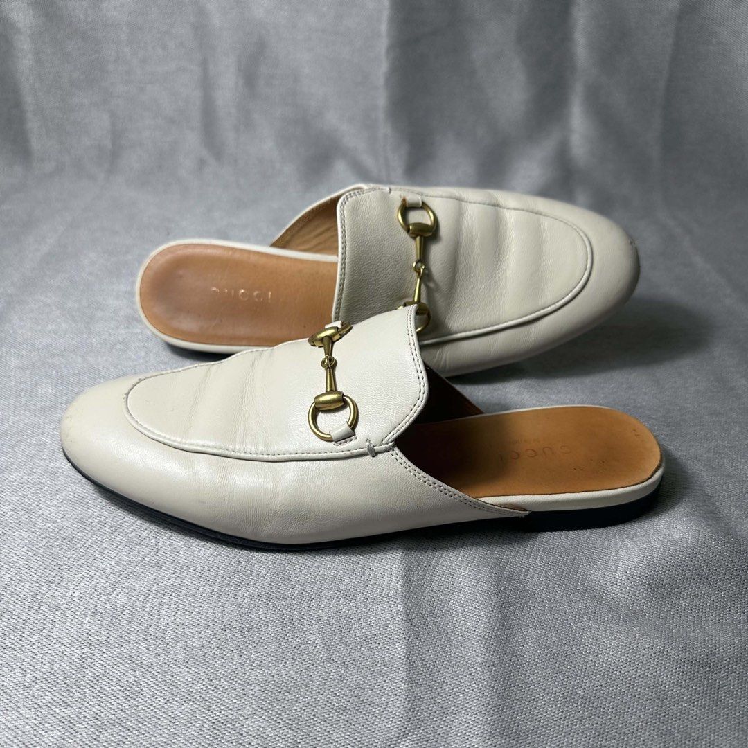 Gucci White Leather Horsebit Mules Size 36 (Category: Sneakers & Footwear) located in Bayombong. Submitted by rochelle_archive_garments (Listing ID 1441907330, Image 1). Description: - Authentic White Leather Gucci Mules - Iconic Horsebit Detail - Size: 36 - Made in Italy.