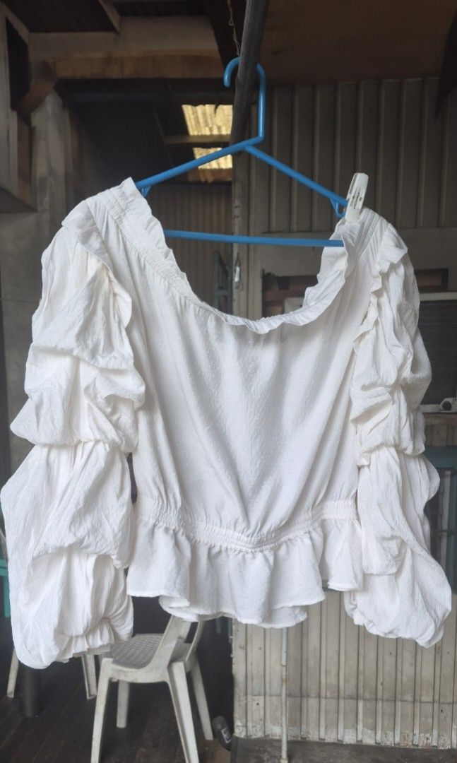 Guess Off Shouder Celestina Top with Tags (Category: Blouses) located in Quezon City. Submitted by yasisugar13 (Listing ID 1441910566, Image 3). Description: - Brand: Guess - Item: Off shoulder Celestina top -color: Off white - Size: XL on tag - Fabric: Textured french/swiss dots - Condition: Brand new with original tags attached - Style: Perfect for casual or dressy outfits - Best fit to 40-42.
