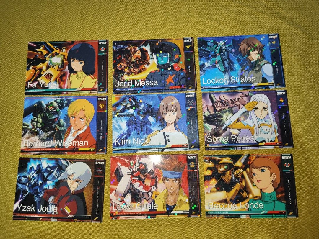 Gundam Trading Cards Collection (Category: Raw Singles) located in Antipolo. Submitted by rllenrapnap (Listing ID 1441915851, Image 3). Description: - Collection of Gundam trading cards - 104 pcs take all bandai - made in japan - Features iconic mobile suits like Over Flag and Zaku - Includes characters such as M'Quve - Perfect for any Gundam enthusiast - Some cards boast holographic effects - All cards are officially from the Gundam series.