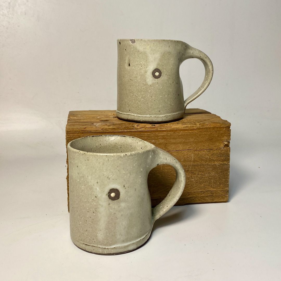Handmade Ceramic Espresso Mug with Geometric Design (Category: Coffee & Tea Tableware) located in Quezon City. Submitted by madiscollectibles (Listing ID 1441924240, Image 3). Description: - Set of 2 handmade ceramic mugs - Unique geometric stamped patterns on each mug - Speckled light grey glaze - Ideal for coffee or tea - Artisanal and one-of-a-kind pieces.
