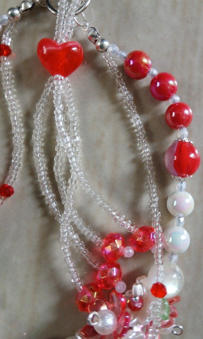 HANDMADE PHONE BAG KEYCHAIN CHARMS ( Red Flower ) (Category: Handmade Craft) located in Cavite. Submitted by jiearah.online.shop (Listing ID 1441824621, Image 3). Description: HANDMADE PHONE BAG KEYCHAIN CHARMS Materials/Beads used are all international beads ( mix of resin, metal, acrylic and wood ) Price : Php 180 +sf (Shipping Fee NOT INCLUDED. Wala pong free shipping) Mode of Payment : GCASH or PayMaya Courier : J&T ( We use j&t app to comput