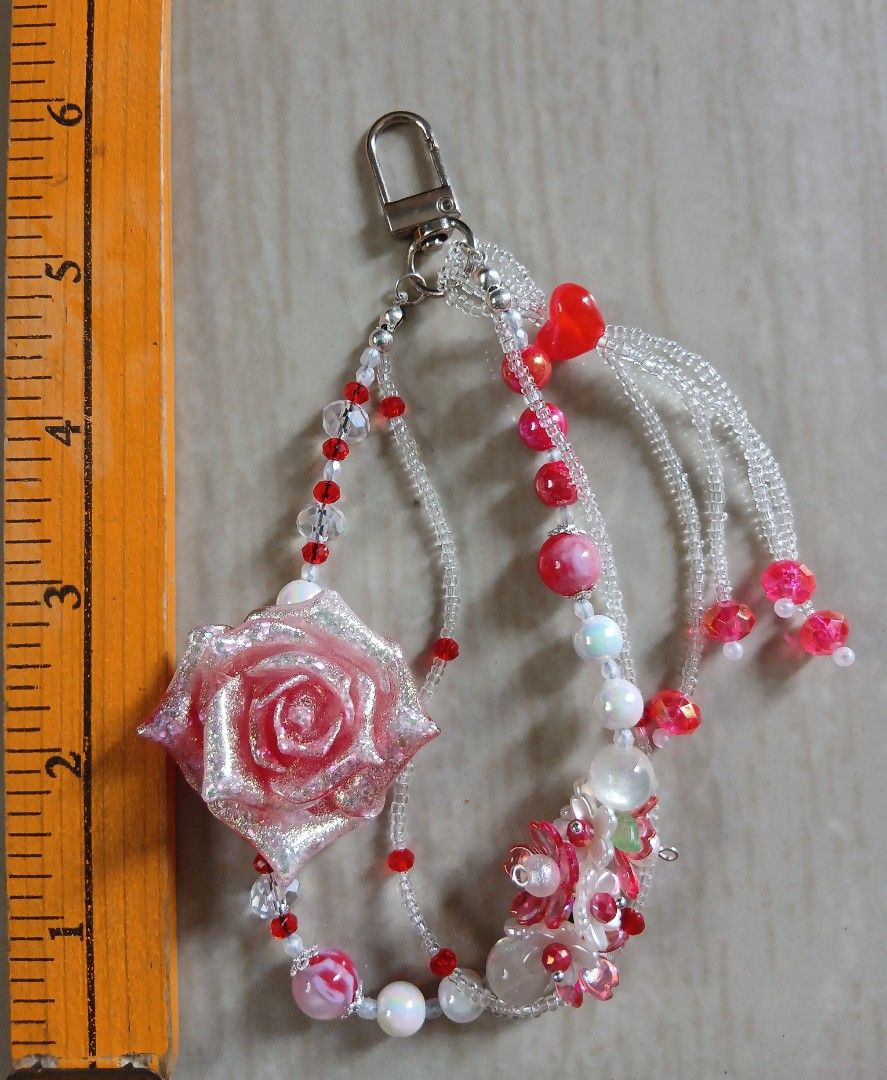 HANDMADE PHONE BAG KEYCHAIN CHARMS ( Red Flower ) (Category: Handmade Craft) located in Cavite. Submitted by jiearah.online.shop (Listing ID 1441824621, Image 1). Description: HANDMADE PHONE BAG KEYCHAIN CHARMS Materials/Beads used are all international beads ( mix of resin, metal, acrylic and wood ) Price : Php 180 +sf (Shipping Fee NOT INCLUDED. Wala pong free shipping) Mode of Payment : GCASH or PayMaya Courier : J&T ( We use j&t app to comput