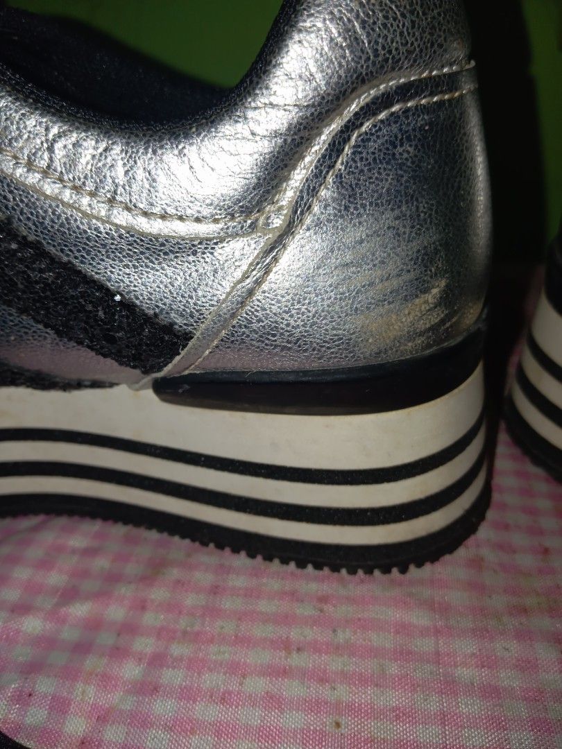 Hogan Silver and Black Platform Sneakers size 36 (Category: Sneakers) located in San Pedro. Submitted by bcollector83101 (Listing ID 1441840664, Image 3). Description: Preloved, little flaws shown in pictures. Size 36. last price posted.