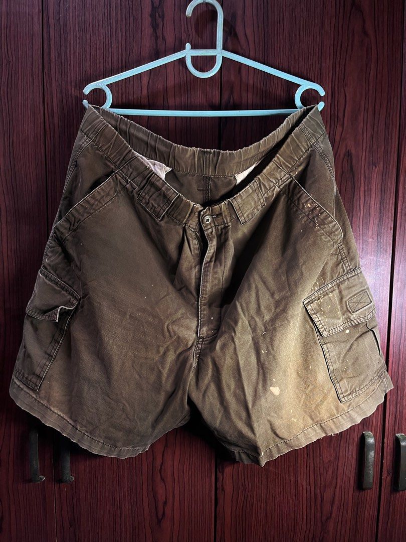 Kirkland Baggy Cargo Shorts (Category: Shorts) located in Manila. Submitted by chiyooo787 (Listing ID 1441874105, Image 1). Description: Lenght: 18” Width: 19” (size 38) Leg hole: 13” Brand: Kirkland Color rate: 8/10 Issue: Paint stains and putol Zipper - brown 6 pockets baggy cargo shorts +sf for buyers.