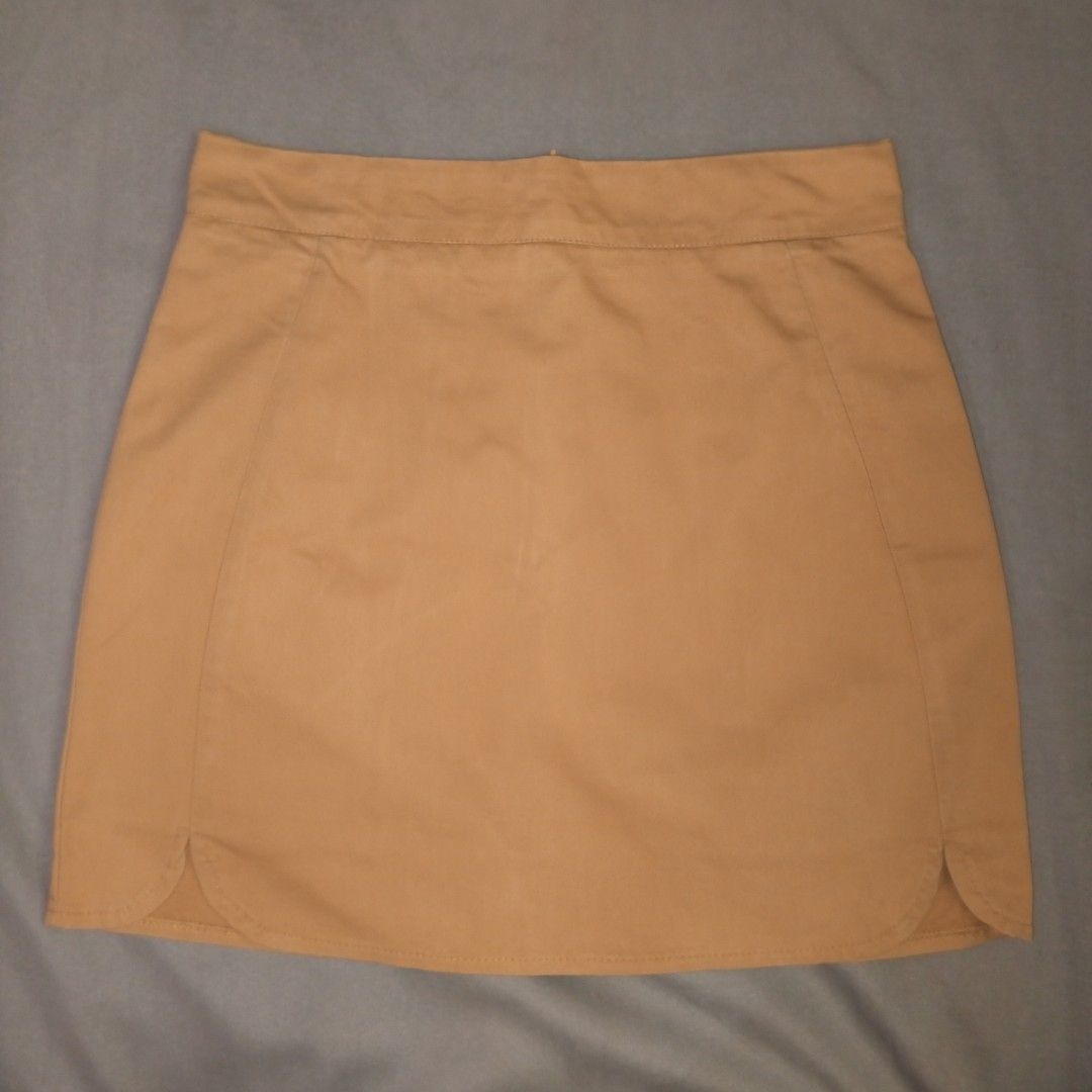 Korean Mini Skirt (Category: Skirts) located in Iligan City. Submitted by mariegail (Listing ID 1441935333, Image 1). Description: - Simple tan mini skirt - Zipper closure at the back - Casual style, great for everyday wear Delivery: via J&T.