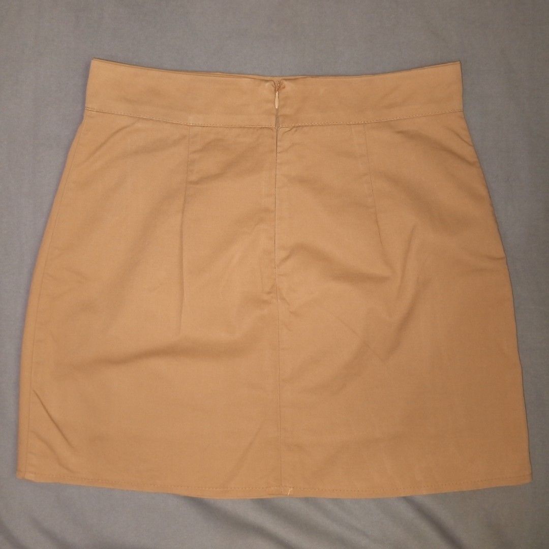 Korean Mini Skirt (Category: Skirts) located in Iligan City. Submitted by mariegail (Listing ID 1441935333, Image 2). Description: - Simple tan mini skirt - Zipper closure at the back - Casual style, great for everyday wear Delivery: via J&T.