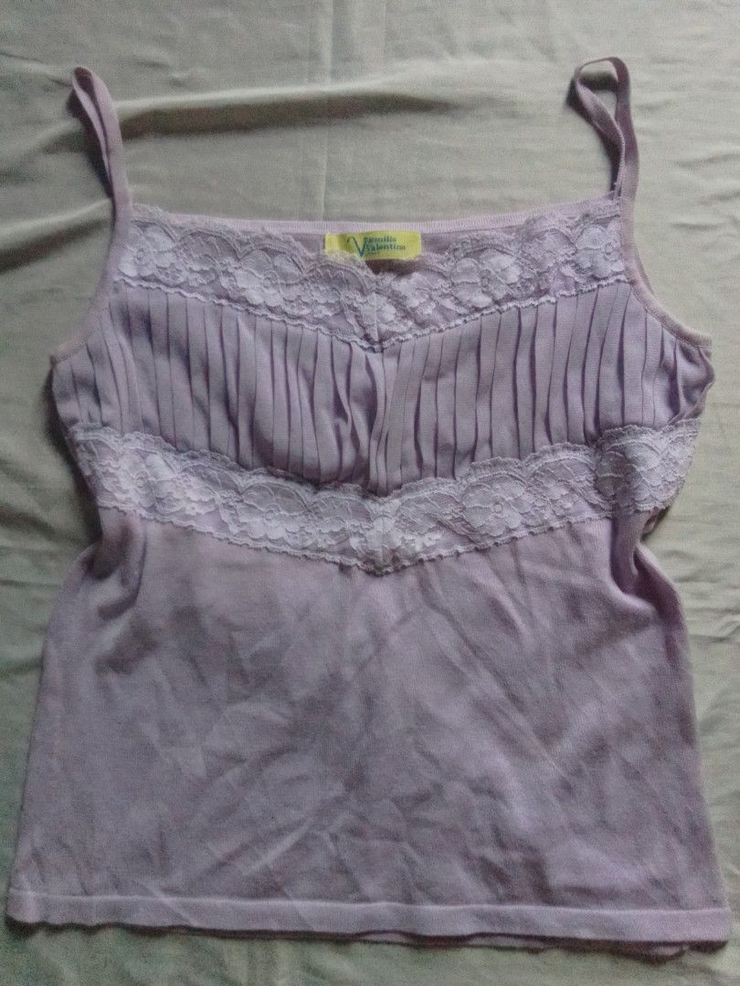 Lavender Lace Trim Camisole Top (Category: Sleeveless) located in Manila. Submitted by blessyfindsfashionclo (Listing ID 1441781515, Image 1). Description: - Adorable lavender camisole top - Delicate white lace trim on neckline and hem - Lovely pleated detail on the front - Adjustable spaghetti straps for a perfect fit - Versatile: great for layering or wearing solo.