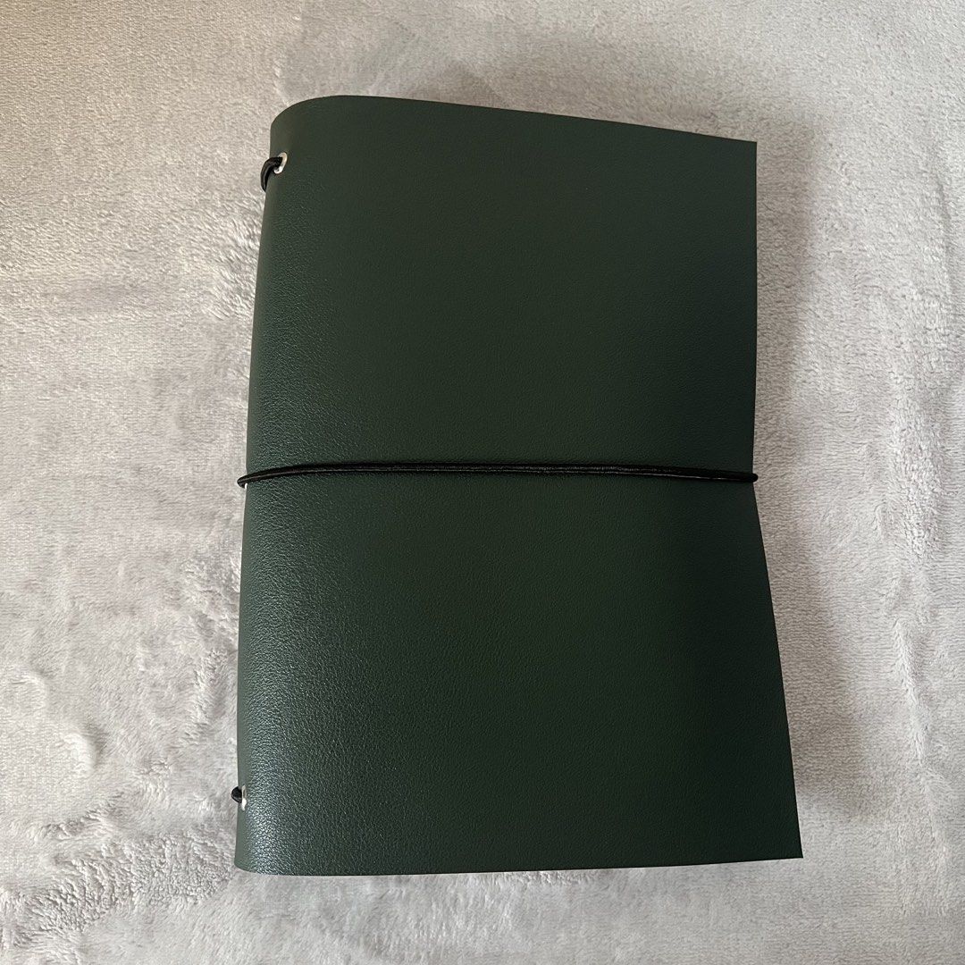 Leather Journal Folio (A5, bifold) (Category: Stationery & School Supplies) located in Quezon City. Submitted by lucky.girlll (Listing ID 1441873924, Image 1). Description: - Olive green - Notebooks not included but fits any standard size A5 notebook - PU leather.