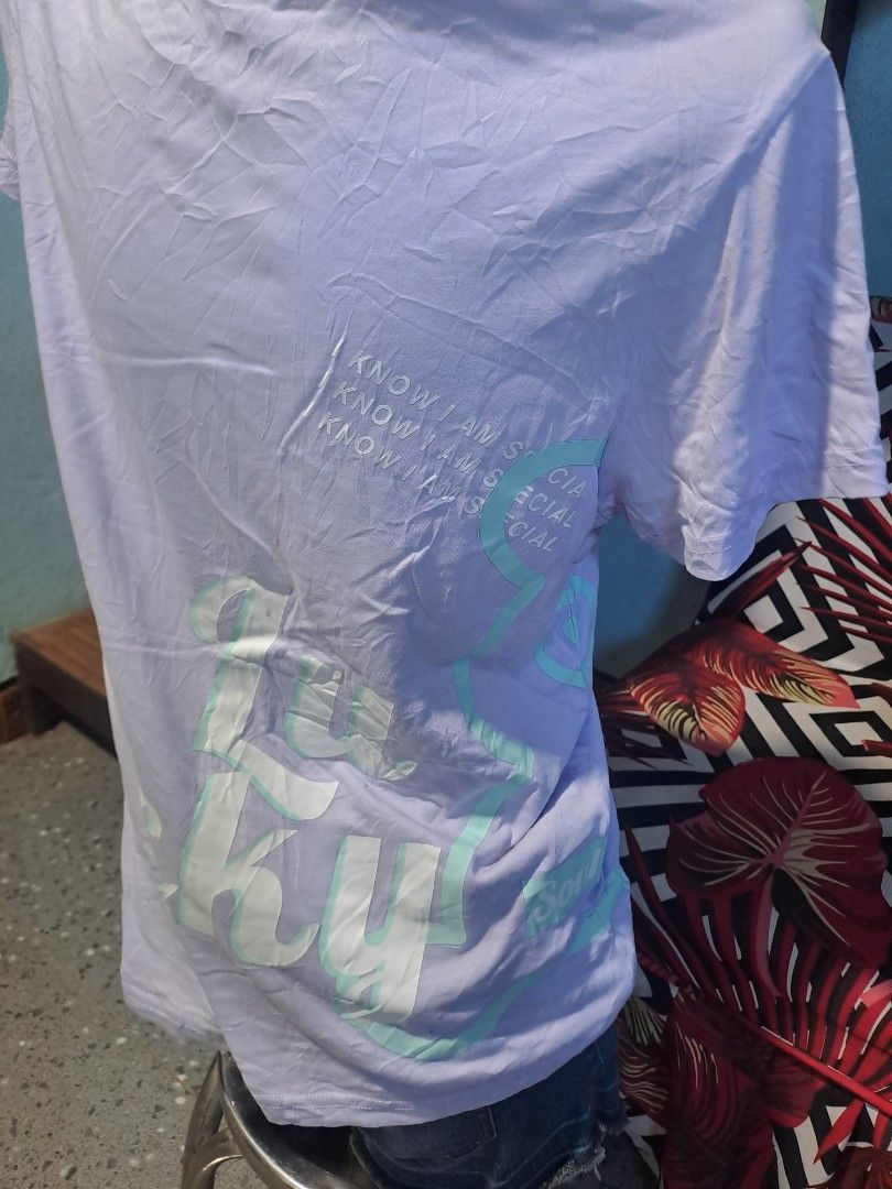 Light Purple T-shirt with 'READY' Graphic - Size Medium (Category: Shirts) located in Manila. Submitted by zamfindsii (Listing ID 1441789820, Image 2). Description: Light purple 'READY' graphic tee, size medium. Casual and comfy for everyday. Selected Ukay Ukay expect signs of used need wash.
