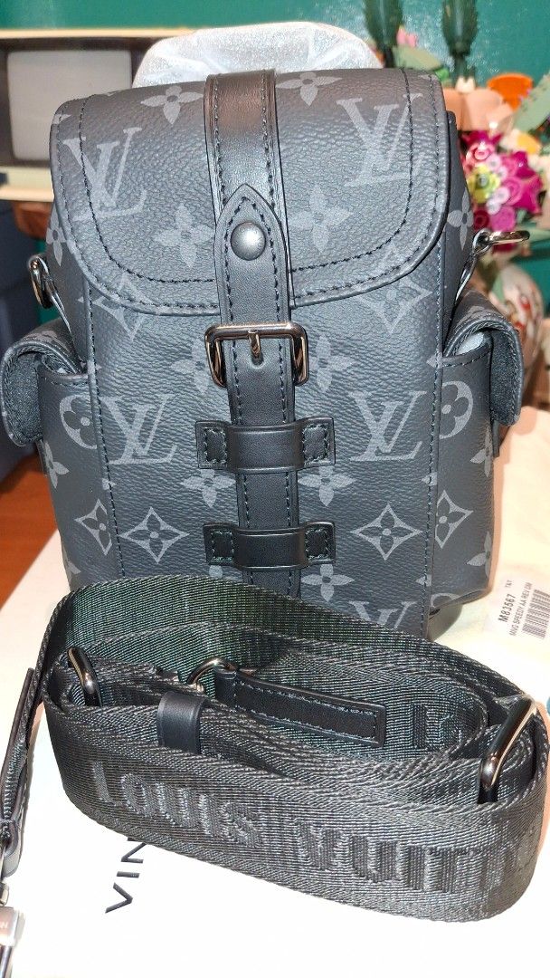 Louis Vuitton Monogram Christopher Bag (Category: Luxury Bags & Wallets) located in Angono. Submitted by bagamania (Listing ID 1441788108, Image 2). Description: - Louis Vuitton Christopher XS Bag - Classic Monogram Pattern - Black and Grey Colorway - Buckle Closure - Adjustable Strap - Comes with Dust Bag - Ideal for carrying essentials - Unisex - NGA.