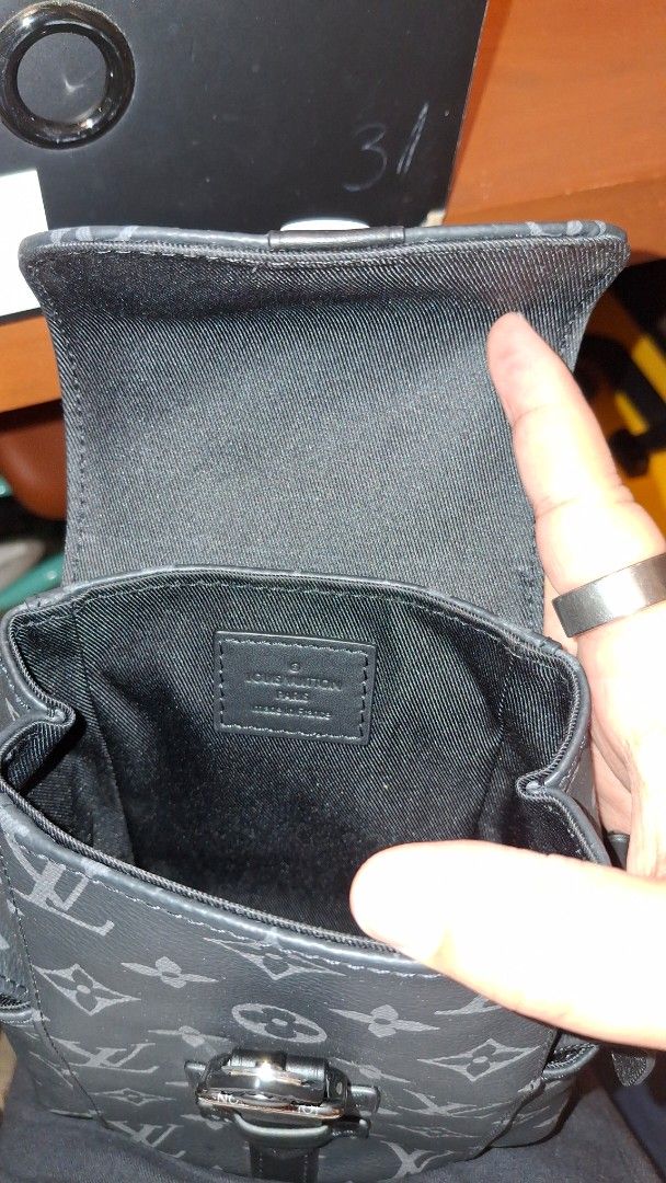 Louis Vuitton Monogram Christopher Bag (Category: Luxury Bags & Wallets) located in Angono. Submitted by bagamania (Listing ID 1441788108, Image 3). Description: - Louis Vuitton Christopher XS Bag - Classic Monogram Pattern - Black and Grey Colorway - Buckle Closure - Adjustable Strap - Comes with Dust Bag - Ideal for carrying essentials - Unisex - NGA.
