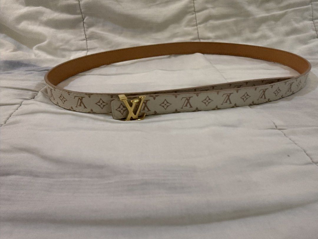 Louis Vuitton Monogram Reversible Belt Gold Buckle (Category: Luxury Accessories) located in Paranaque City. Submitted by lovebrand (Listing ID 1441952899, Image 1). Description: - Classic Louis Vuitton belt - Iconic monogram pattern on one side - Reversible with plain tan leather on the other side - Features a gold-tone LV buckle - Approximately 38 inches in length - A versatile accessory to complete any outfit Very lightly used.
