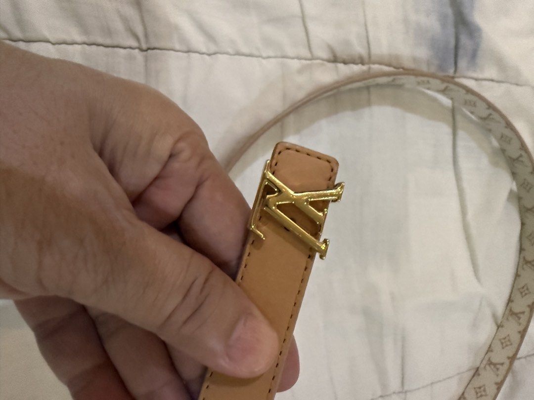 Louis Vuitton Monogram Reversible Belt Gold Buckle (Category: Luxury Accessories) located in Paranaque City. Submitted by lovebrand (Listing ID 1441952899, Image 3). Description: - Classic Louis Vuitton belt - Iconic monogram pattern on one side - Reversible with plain tan leather on the other side - Features a gold-tone LV buckle - Approximately 38 inches in length - A versatile accessory to complete any outfit Very lightly used.