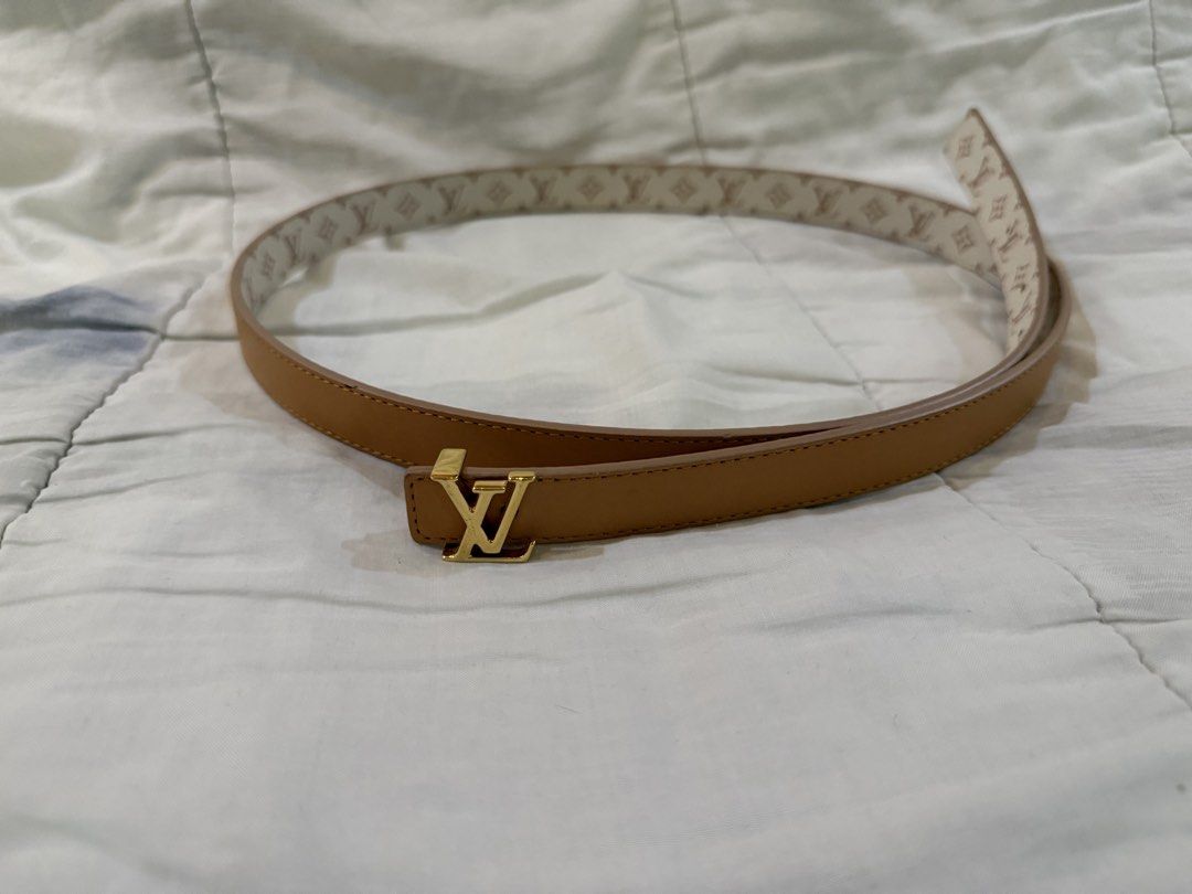 Louis Vuitton Monogram Reversible Belt Gold Buckle (Category: Luxury Accessories) located in Paranaque City. Submitted by lovebrand (Listing ID 1441952899, Image 2). Description: - Classic Louis Vuitton belt - Iconic monogram pattern on one side - Reversible with plain tan leather on the other side - Features a gold-tone LV buckle - Approximately 38 inches in length - A versatile accessory to complete any outfit Very lightly used.