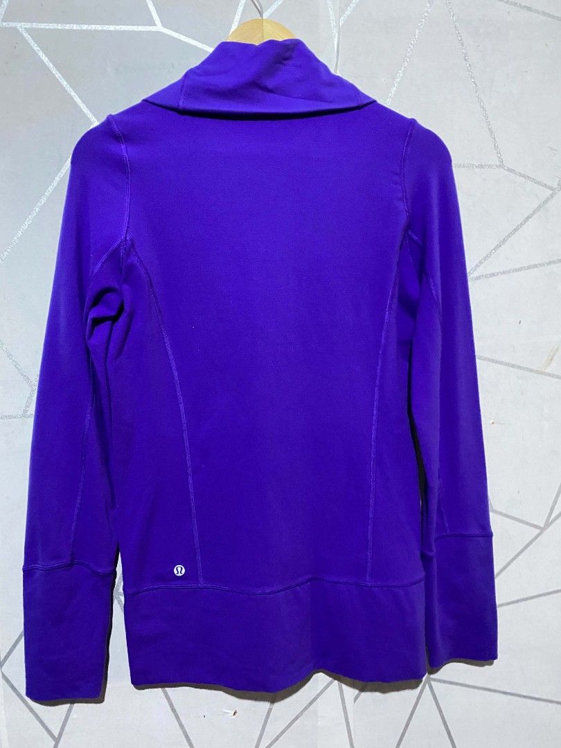 Lululemon Purple Zip-Up Jacket with Thumbholes (Category: Coats, Jackets and Outerwear) located in Gumaca. Submitted by makuliti (Listing ID 1441796205, Image 2). Description: - Lululemon purple jacket - Full zip closure - Front pockets - Thumbholes on sleeves - Ideal for workouts and casual wear - Comfortable and stylish.